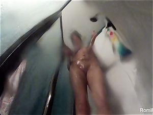 sex industry star Romi Rain brings her camera in the shower